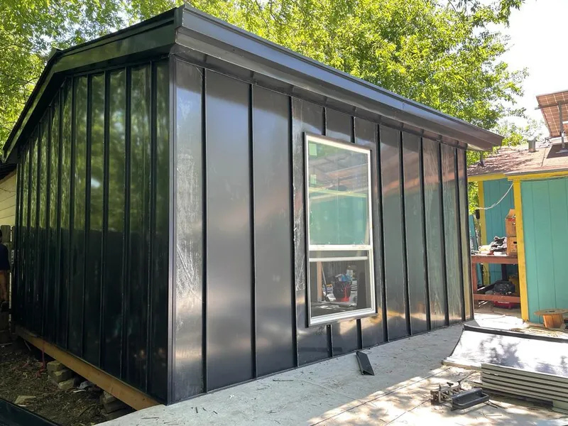 Black standing seam metal wall panels for Roof Inspection in Syracuse