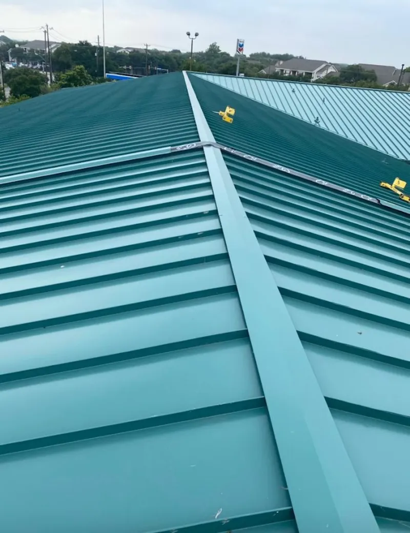 Green commercial metal roof ridge and valley for Metal Roof Repair in Syracuse